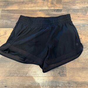 Athleta Black mesh racer Athletic Shorts medium